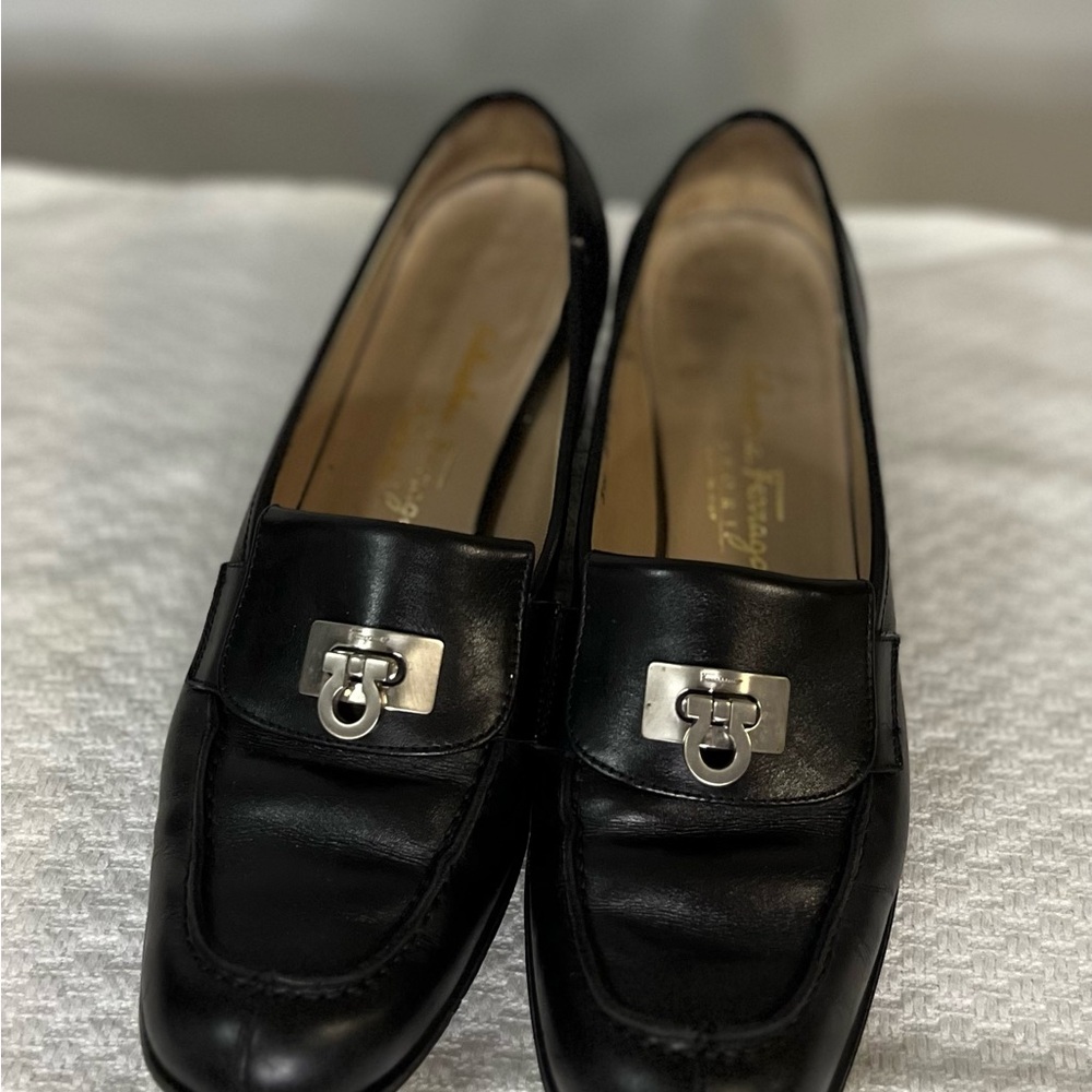 Salvatore Ferragamo Black Loafer Flats with silver logo hardware. Corpcore